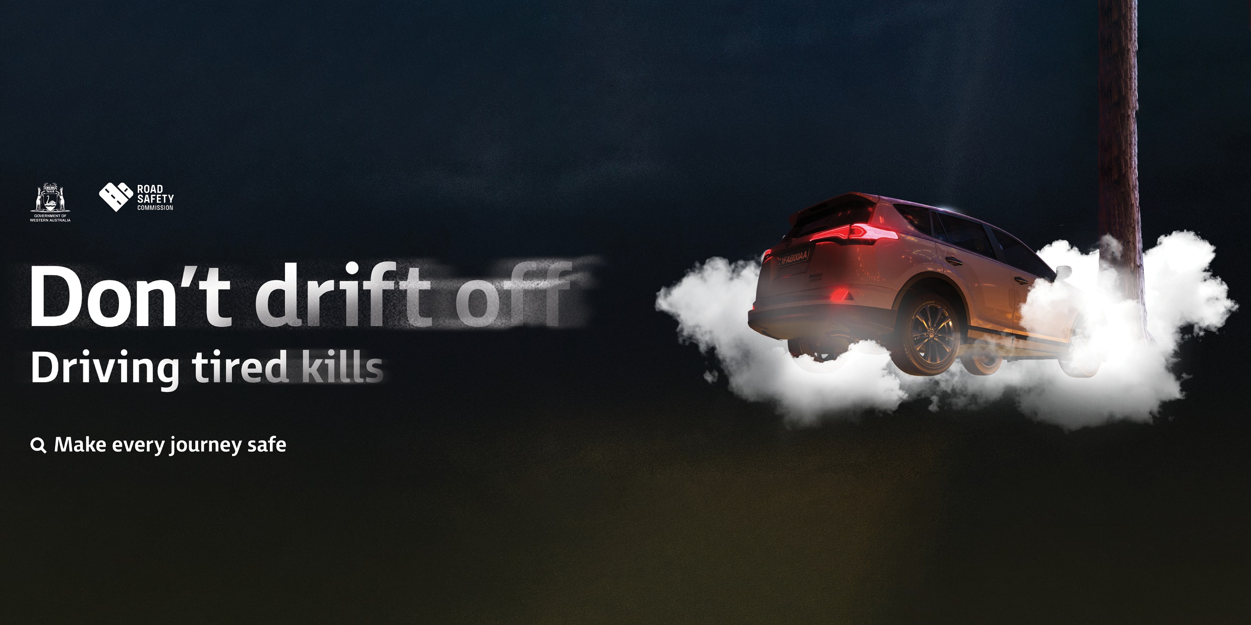 Shows a car crashing into a tree trunk in a cloud of smoke, with the text: Don't drift off, driving tired kills. Make every journey safe.
