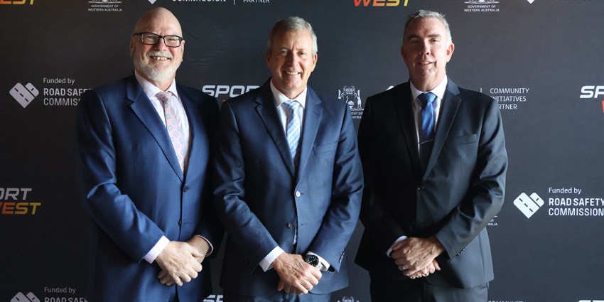 Minister for Road Safety the Hon Reece Whitby MLA poses with Adrian Warner and Troy Kirkham